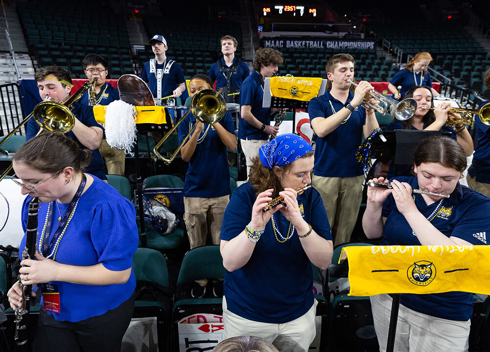 The pep band plays at the MAAC championship