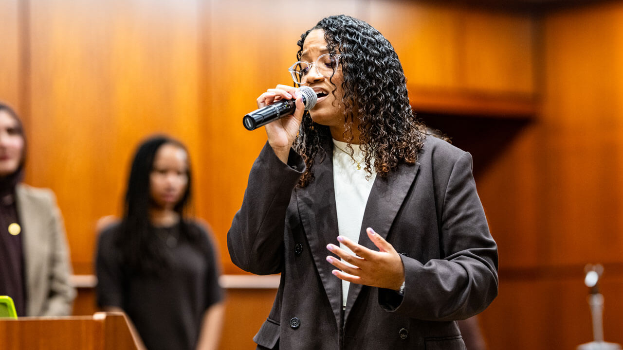 Attendee sings