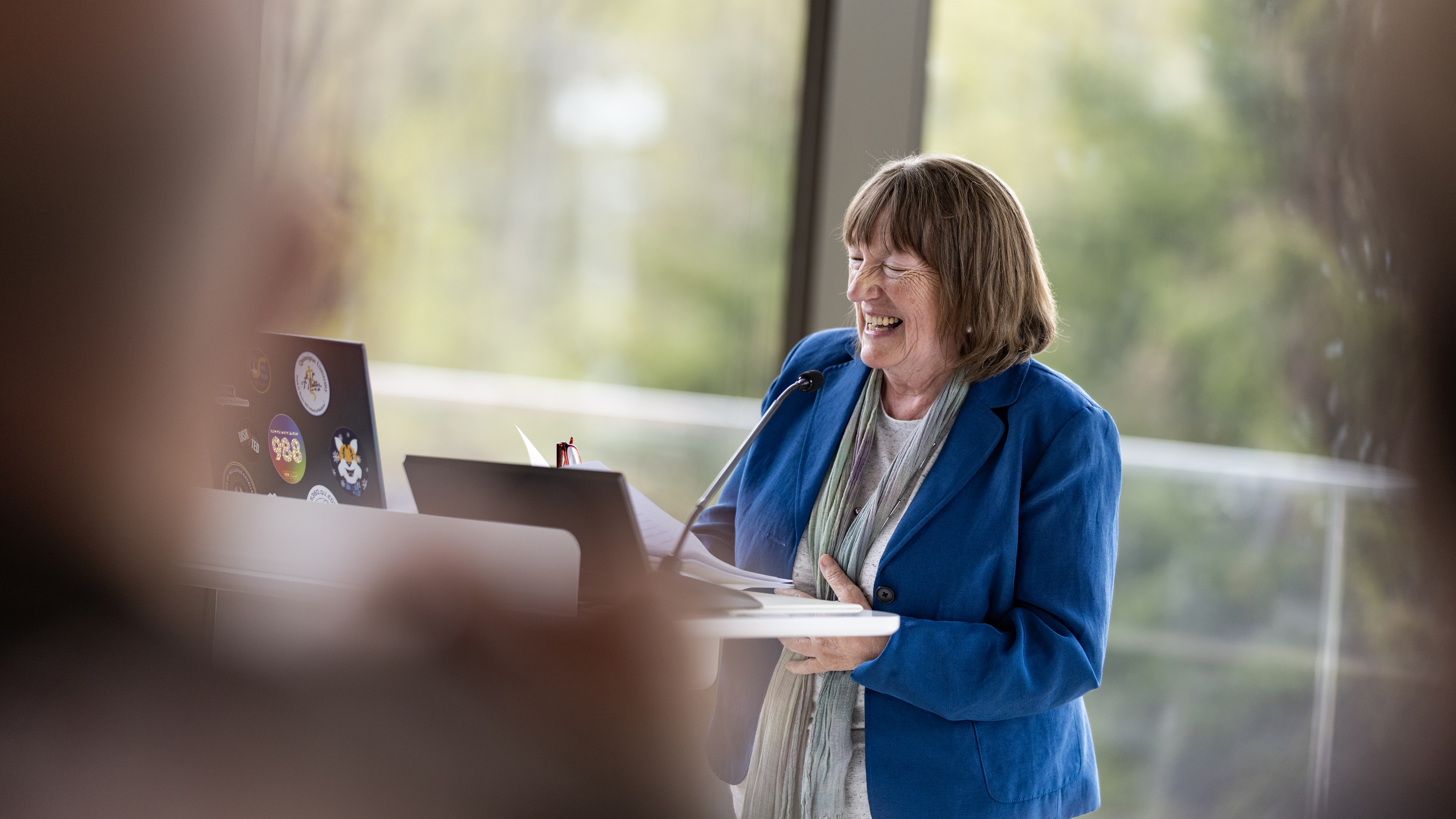 Speaker laughs at the Quinnipiac Faculty Awards