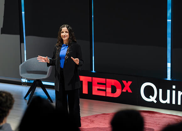 Speaker presenting at the TedX QuinnipiacU event