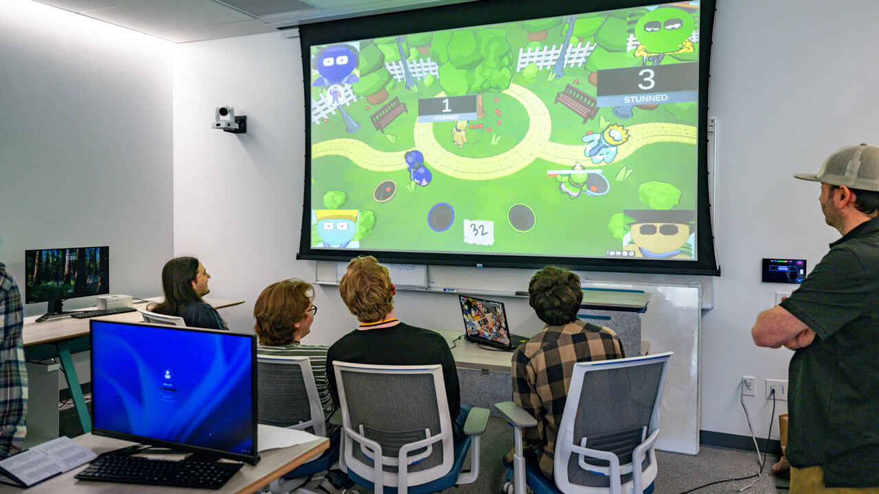 Several students experience the game a fellow classmate created