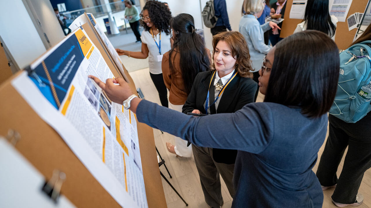 Student presents their research findings