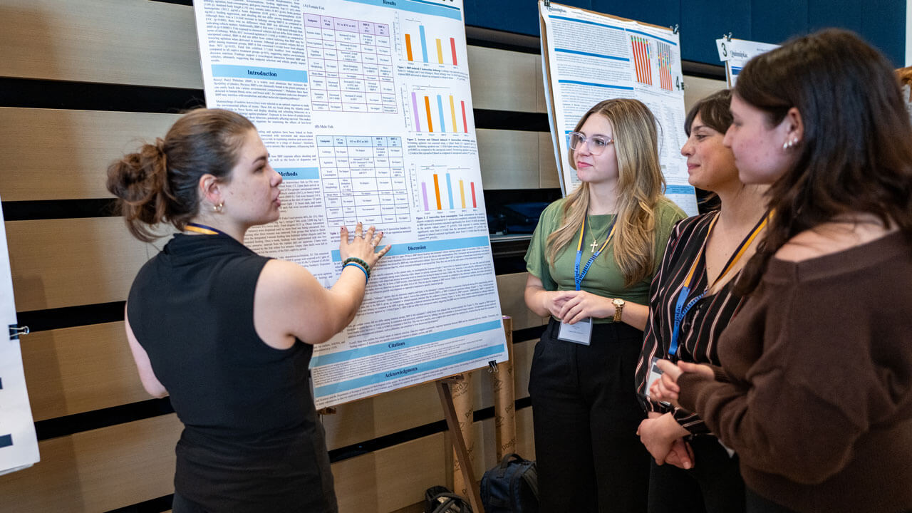 Student presents their research findings