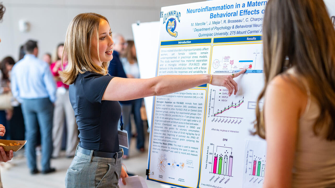 Student presents their research findings