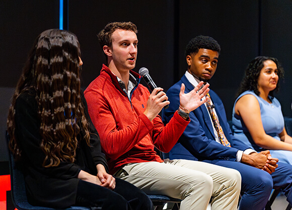 Panelists answering questions at Tedx QuinnipiacU