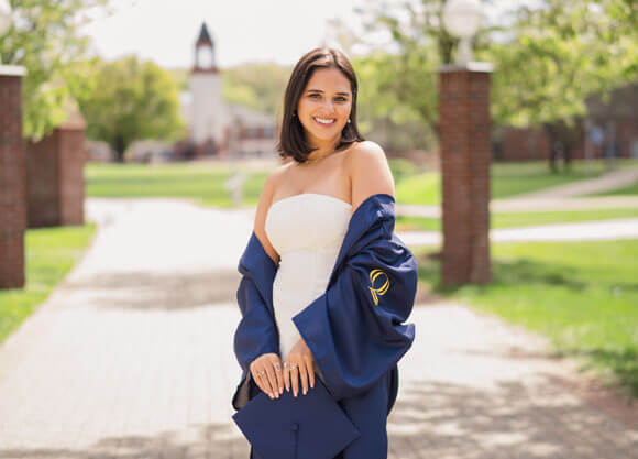 LoPresti poses with cap and gown