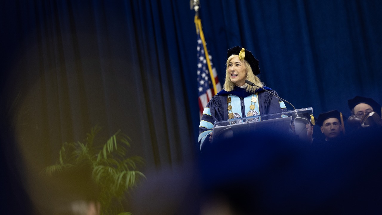President Marie Hardin speaks at the podium