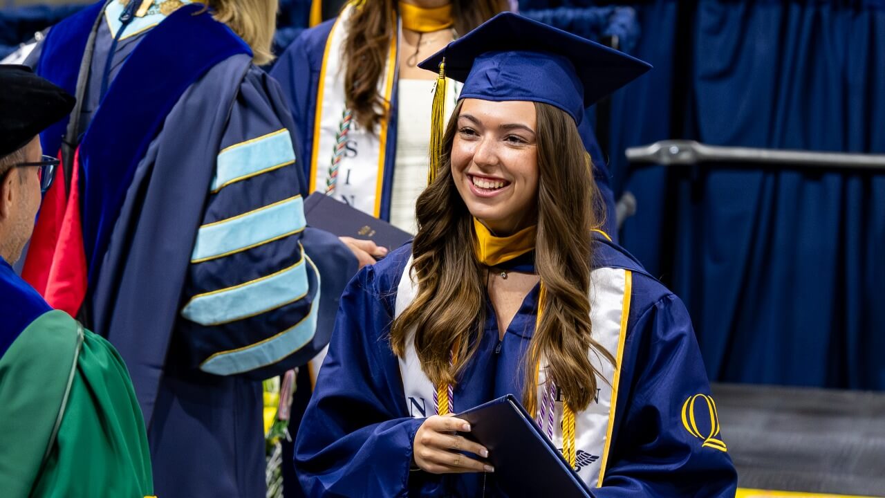Graduate smiling