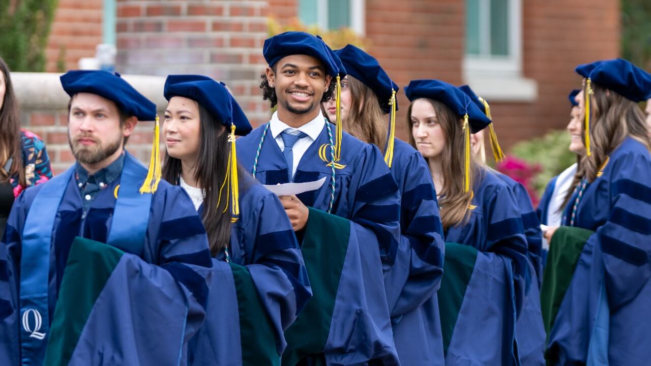 Graduates lining up before crossing the stage