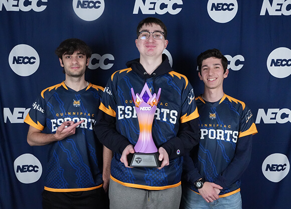 esports Rocket League team with their national championship trophy