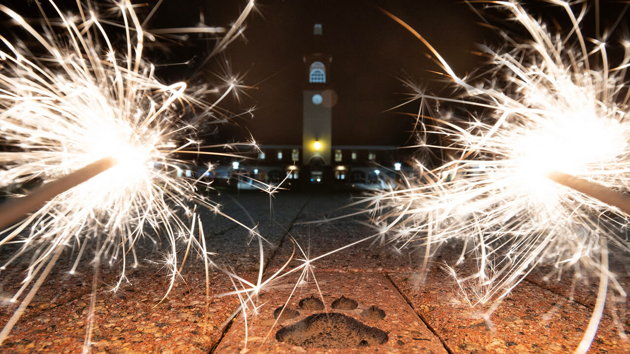 Sparklers in front of the Quinnipiac Arnold Bernhard Library