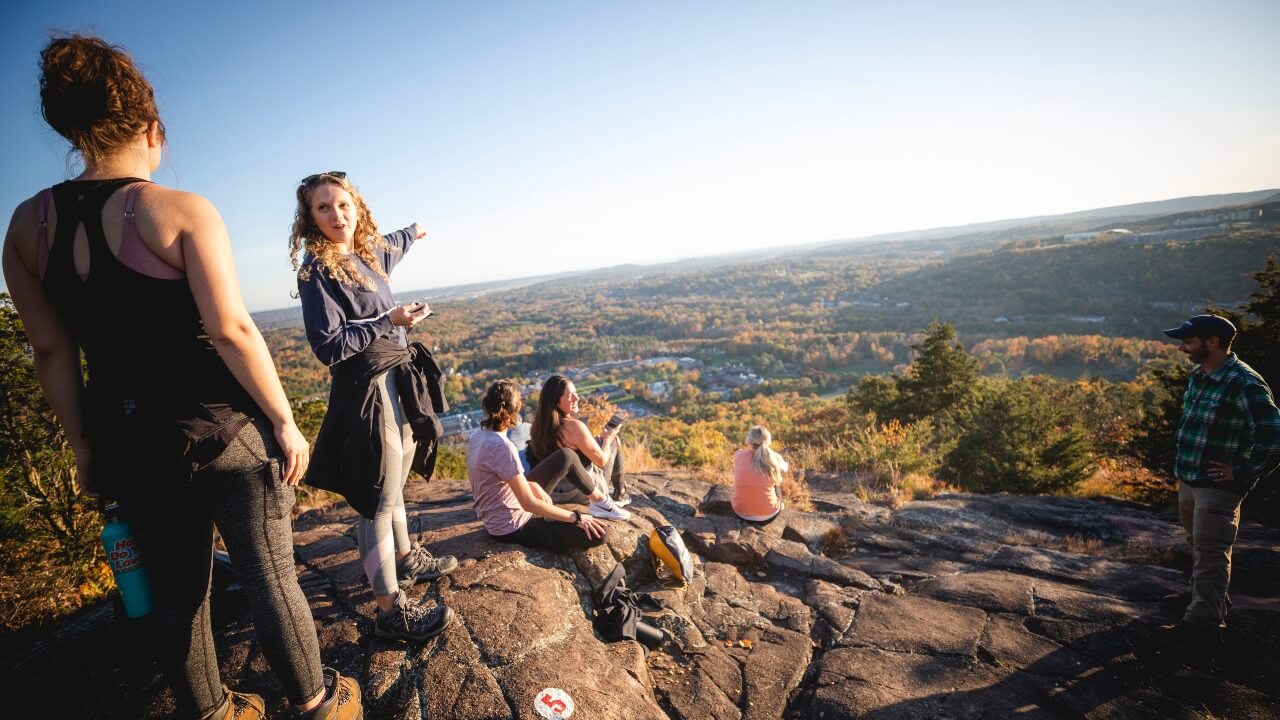 Students and faculty hiking the Sleeping Giant State Park
