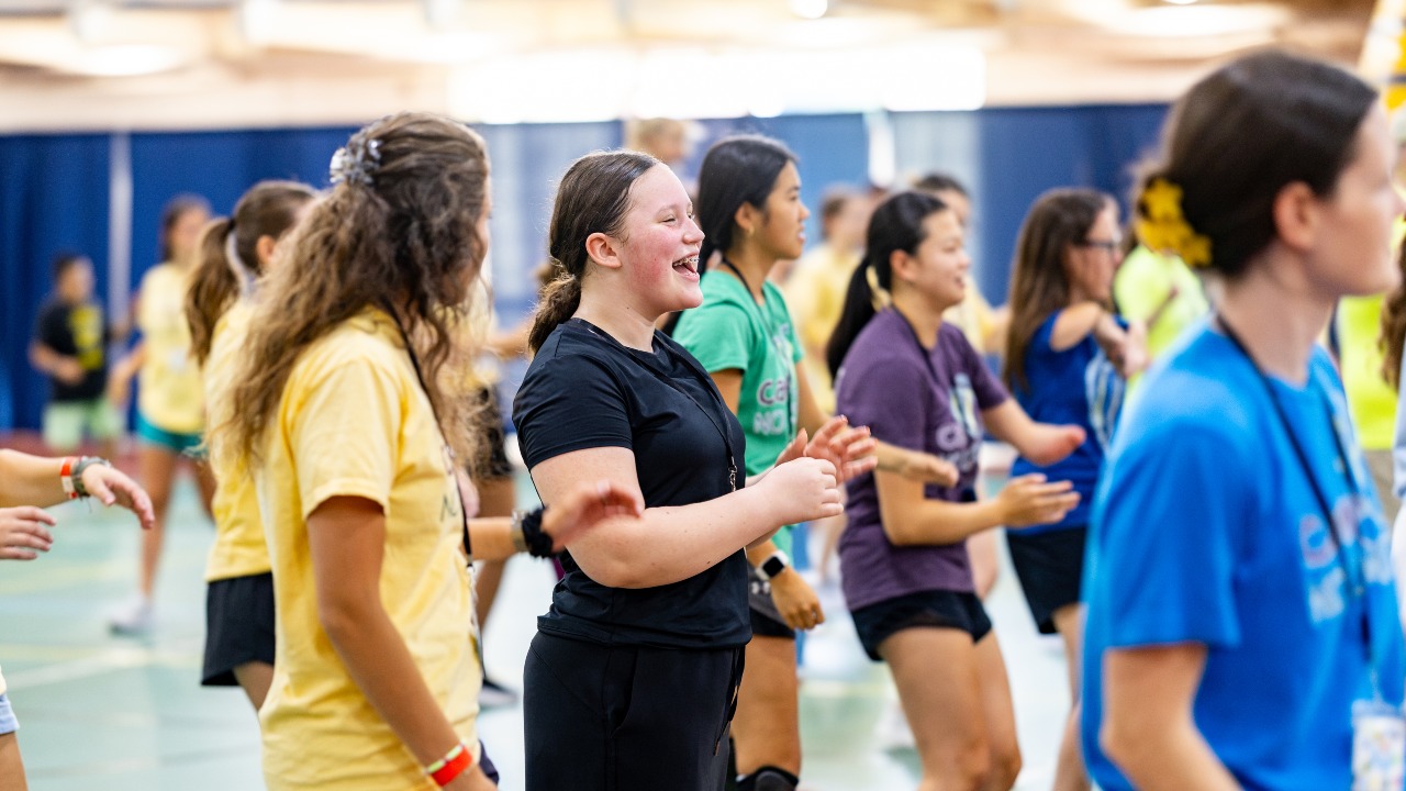 Campers smiling during group activities