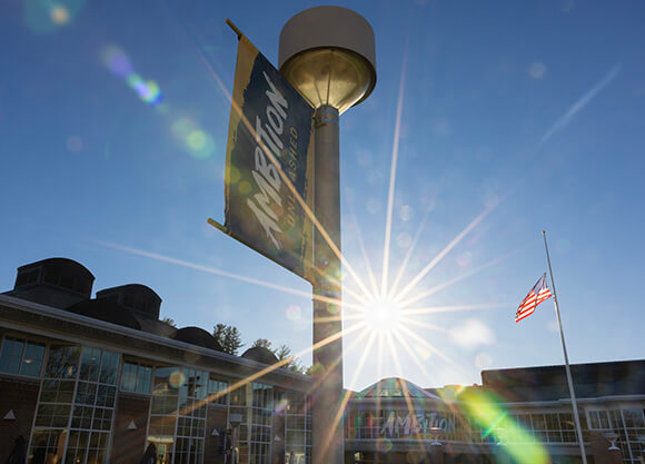 Sun shining behind the Student Center