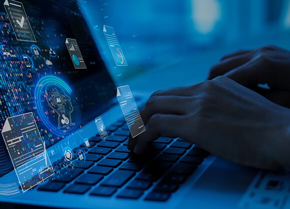 An illustration of a person using a computer.