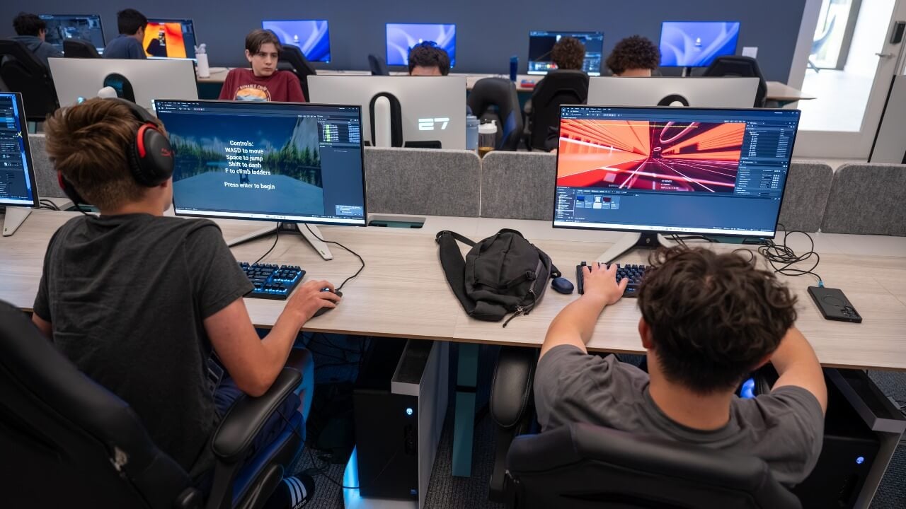 High school students creating games in the Quinnipiac Gaming Lab