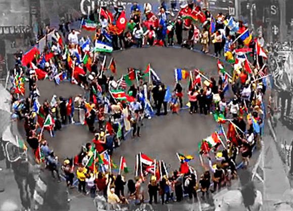 People standing in the shape of a peace sign