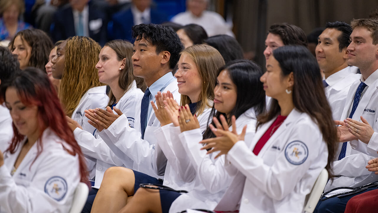 Students clapping