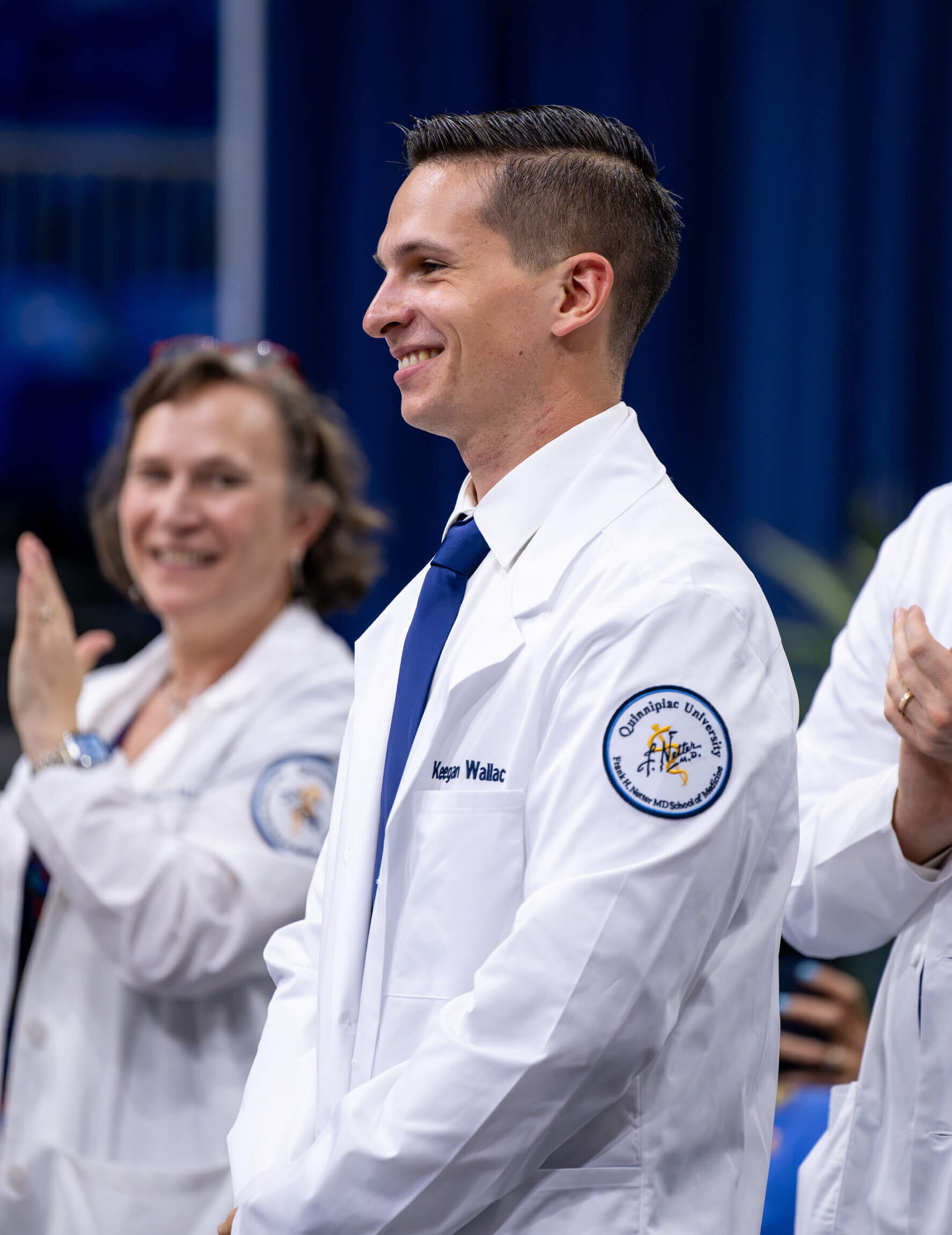 Keegan Wallace, MD ’30 receiving his white coat