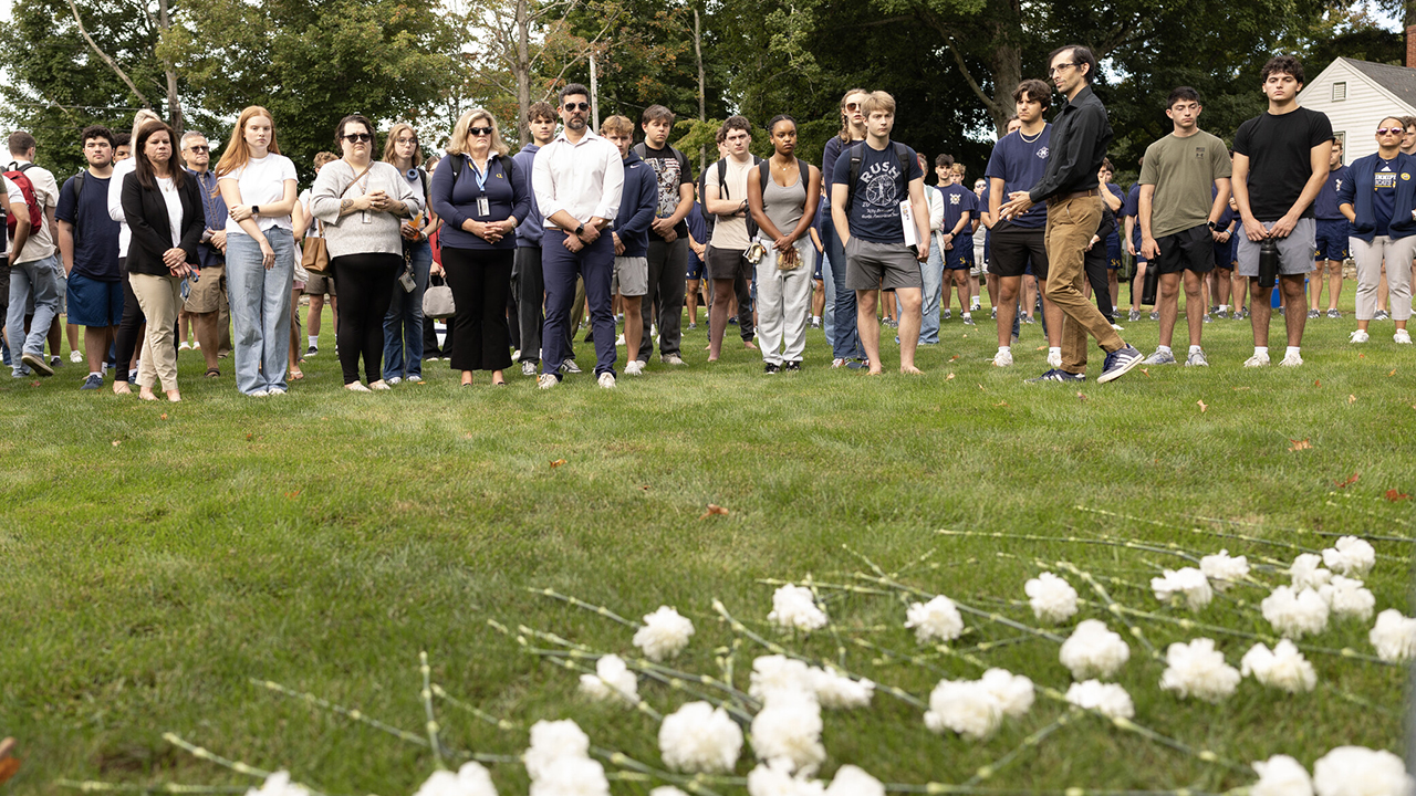 University community gathered around the signs for those who lost their lives